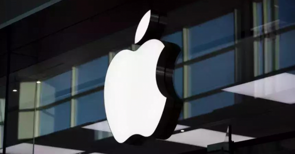 A large Apple logo on the outside of an Apple company