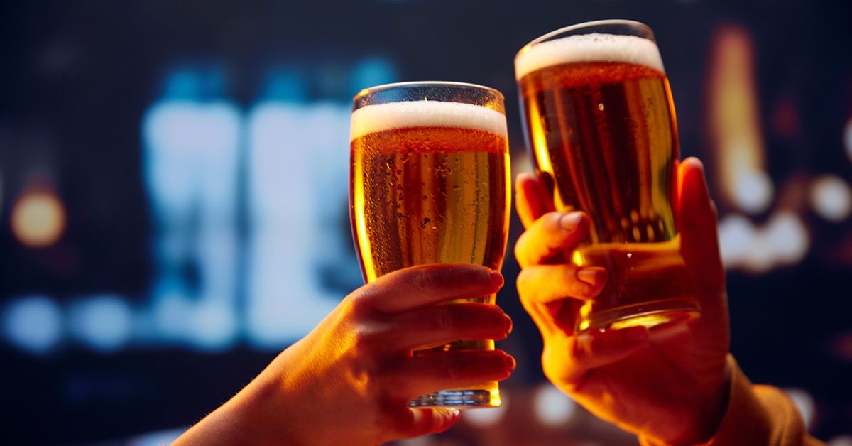 hands cheering with beer.